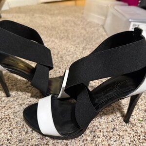 Strappy high-heel sandal, specifically a stiletto sandal by Gloria Ortiz